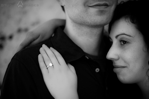 engaged couple on Court Street during their Hoboken engagement session