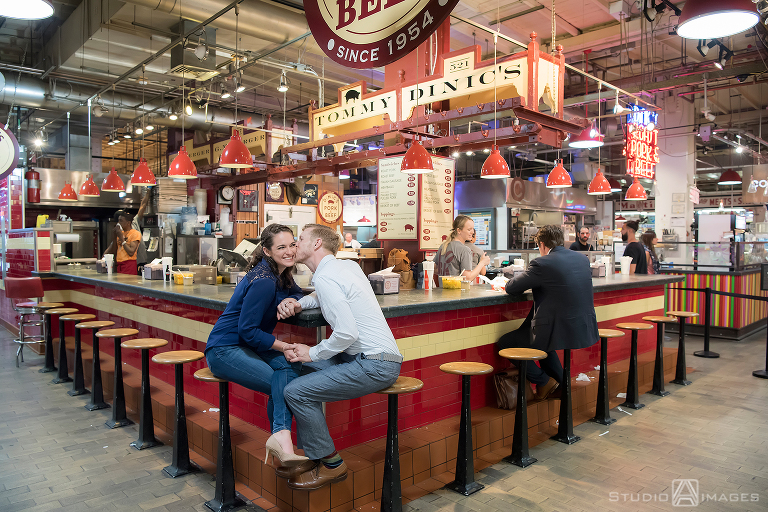 couple at Reading Terminal Market for their engagement photos