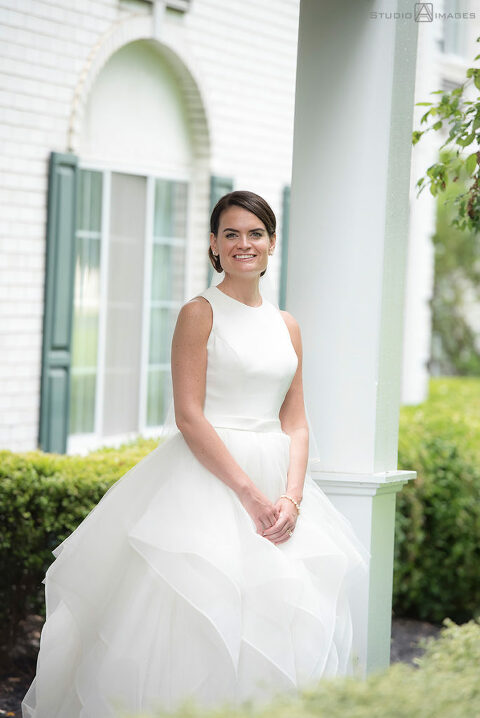 Bride smiling on their wedding day at The Madison Hotel in Morristown. 