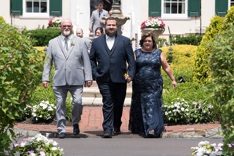 groom walks down the aisle on wedding day at Pen Ryn Estate | Pen Ryn Estate Wedding Photos | Bucks County Wedding Photographer