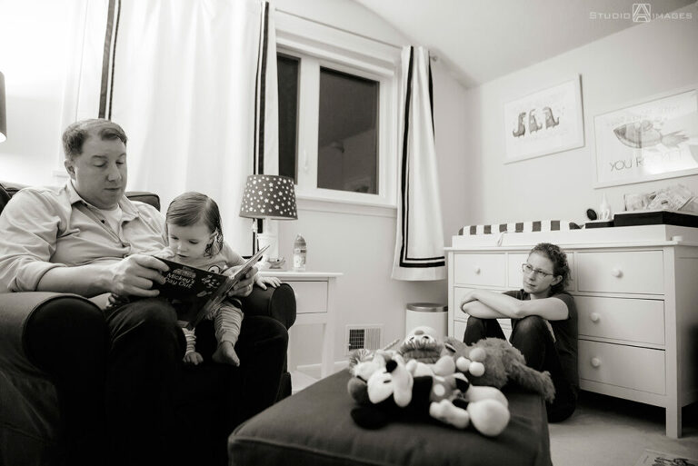 parents and daughter at  bedtime during their Documentary-style day in the life family photo shoot