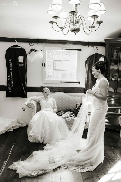 brides getting ready for their wedding ceremony on their wedding day at Grain House in Basking Ridge. LGBTQ wedding 