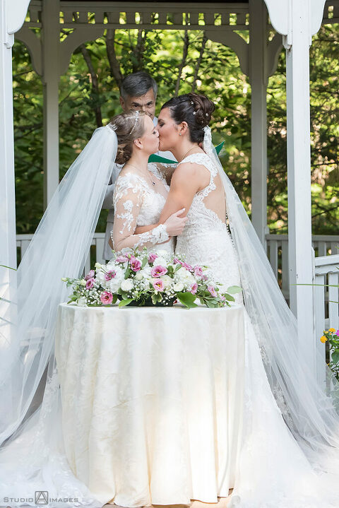 brides during their wedding ceremony at Grain House in Basking Ridge. LGBTQ wedding 