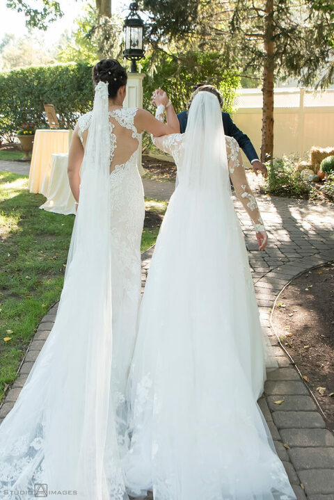 brides at the conclusion of their wedding ceremony at Grain House in Basking Ridge. LGBTQ wedding 