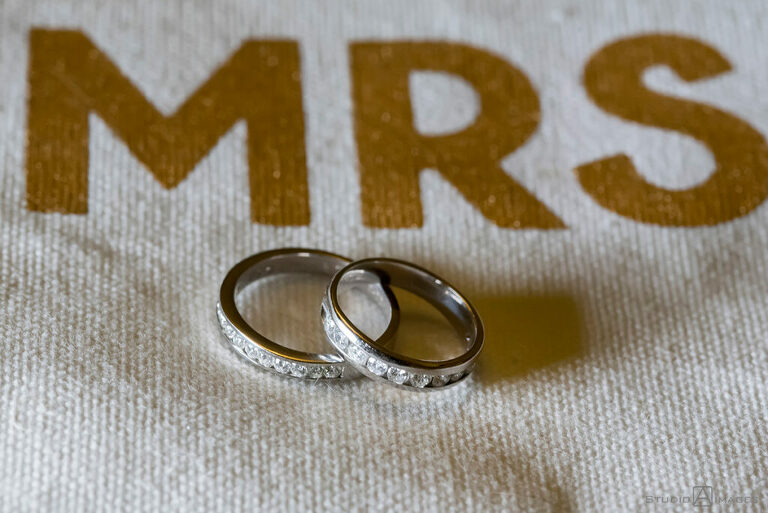 wedding ring detail on MRS bag at wedding at Grain House in Basking Ridge. LGBTQ wedding 