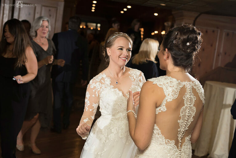 brides dancing during wedding reception at Grain House in Basking Ridge. LGBTQ wedding 