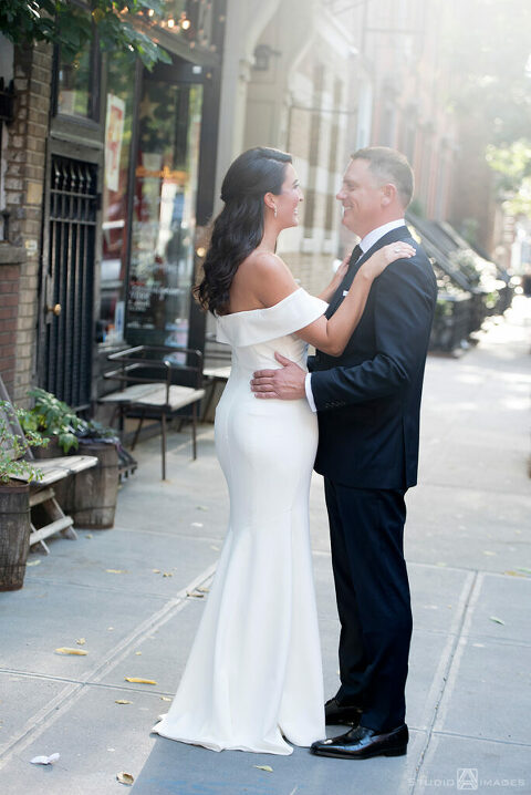 bride and groom on their wedding day in the West Village, NYC before their wedding at Little Owl Townhouse