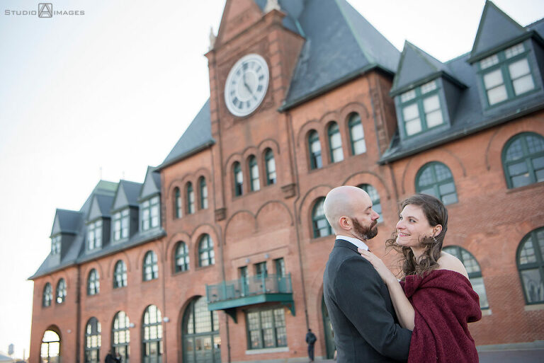 bride and groom posing for portraits in Liberty State Park before their wedding at Liberty House in Jersey City