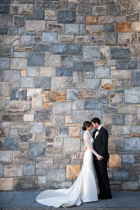 bride and groom on their wedding day at Temple Emanu-El of Closter