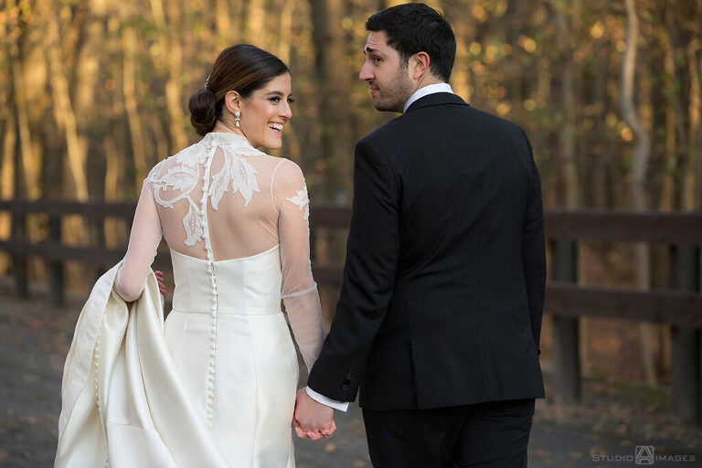 bride and groom on their wedding day at Temple Emanu-El of Closter