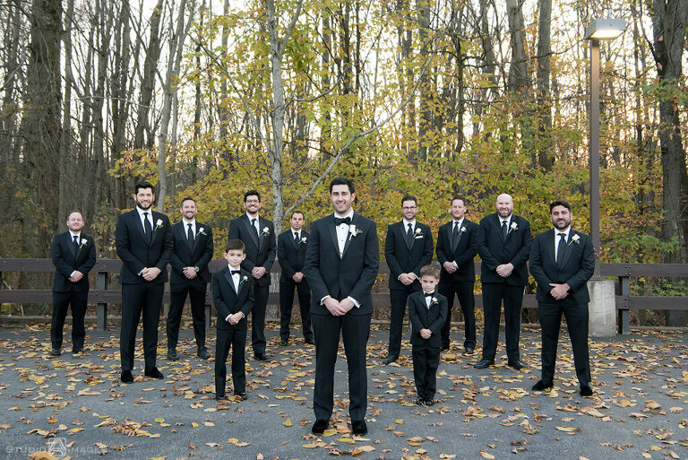 groom and groomsmen on their wedding day at Temple Emanu-El of Closter