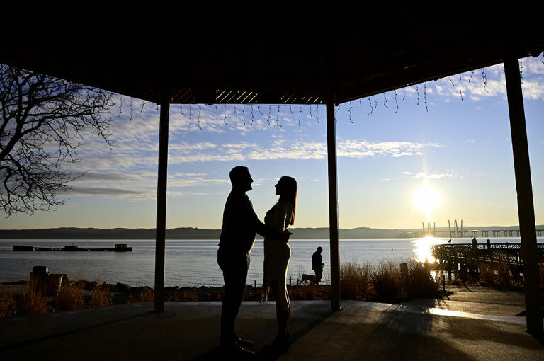 silhouette of couple during their sunrise engagement session in Nyack