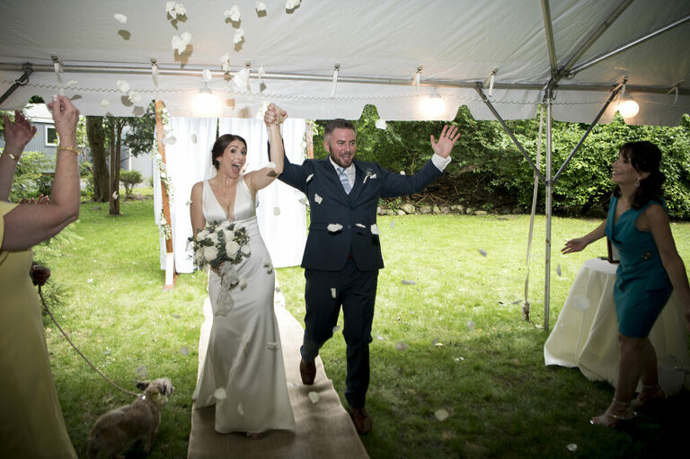 the conclusion of wedding ceremony at New York backyard wedding