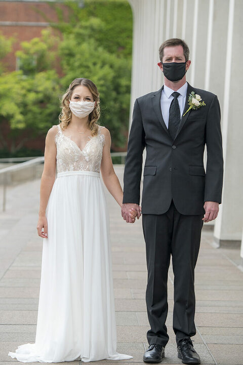 intimate wedding at Princeton University with bride and groom wearing face masks