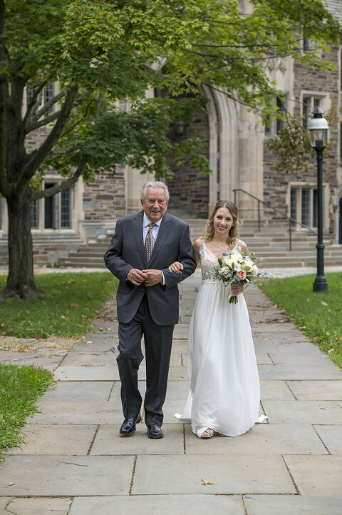 intimate wedding at Princeton University. Father walks bride down the aisle