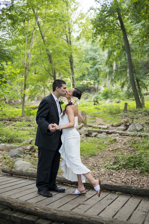 bride and groom kissing on their wedding day at Bear Mountain in Hudson Valley