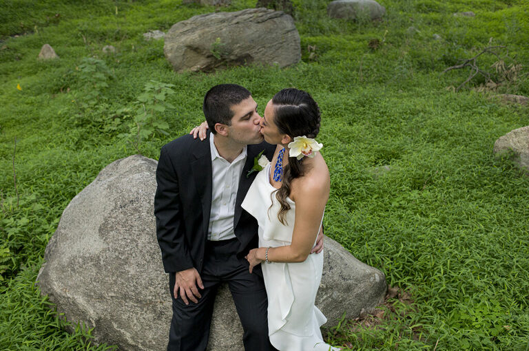bride and groom kissing on their wedding day at Bear Mountain in Hudson Valley