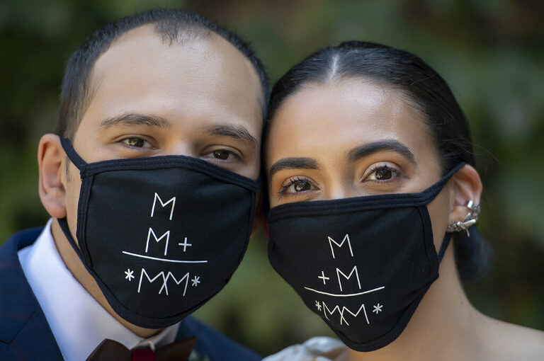 bride and groom wearing matching masks on their wedding day at The Foundry in Long Island City