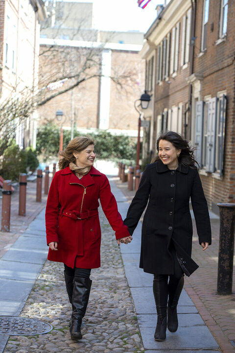 couple walks down Elfreth's Alley during their Philadelphia Engagement Session