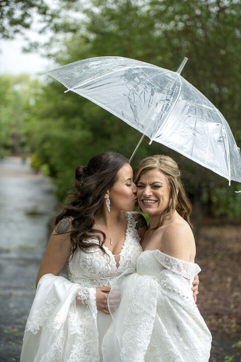 brides on wedding day at Windows on the Water at Frogbridge. LGBTQ wedding