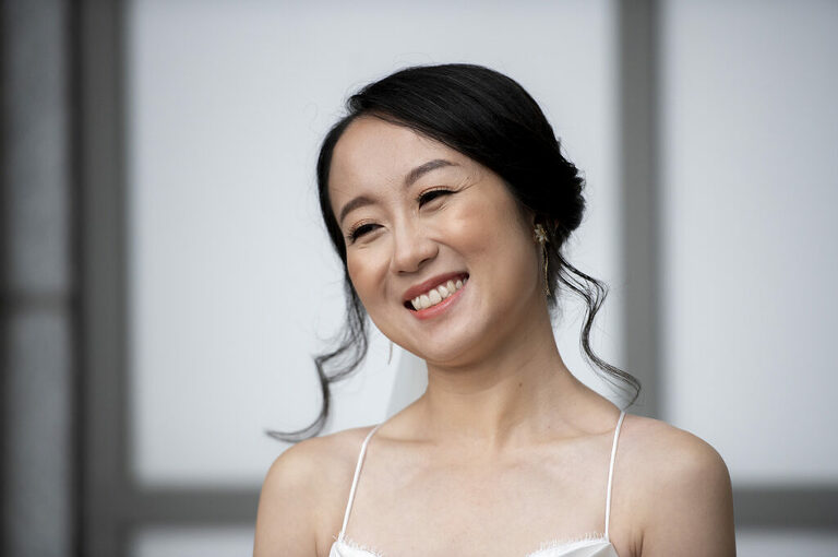 bride posing on her wedding day in NYC