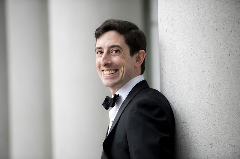 groom posing on his wedding day in NYC