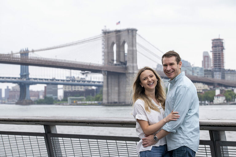 couple at South Street Seaport for their engagement session in NYC