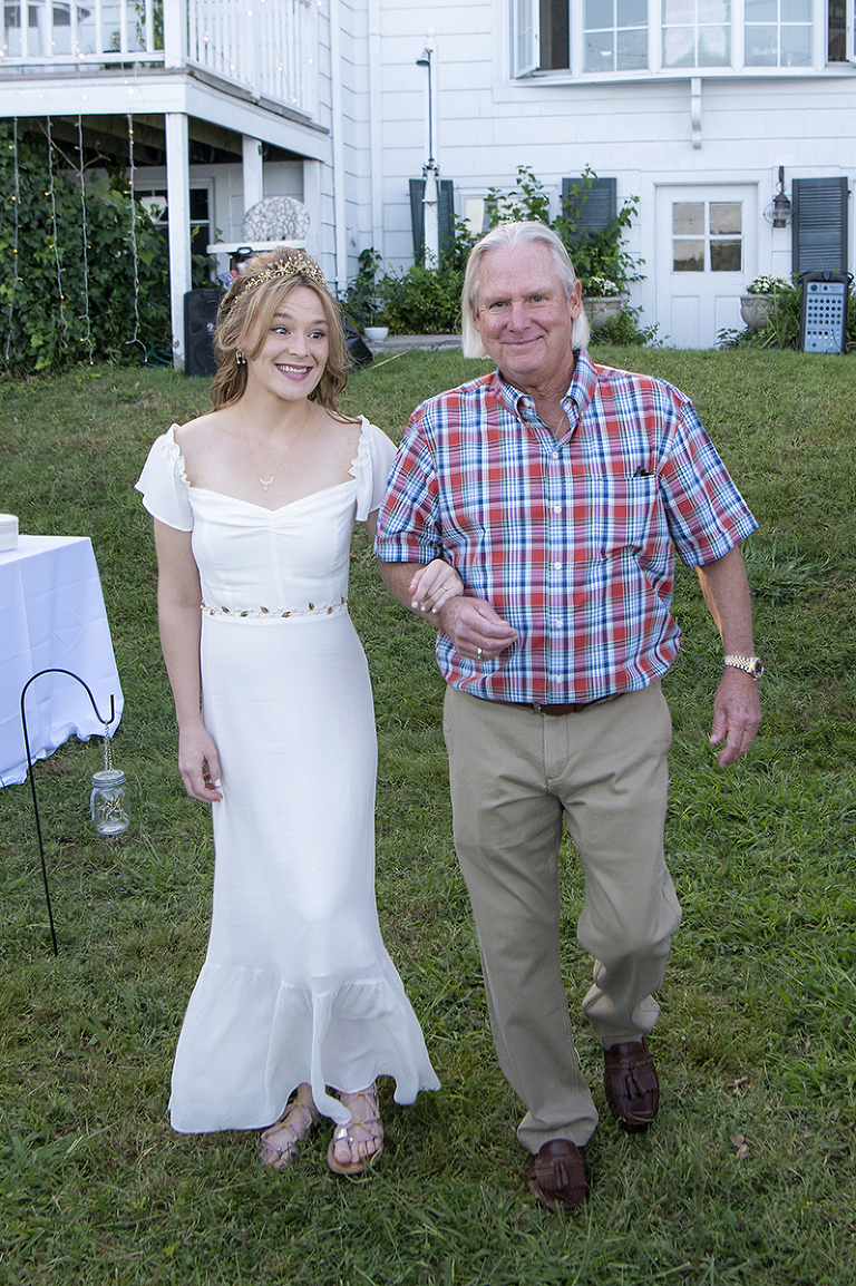father walks bride down the aisle at Oyster Bay backyard wedding