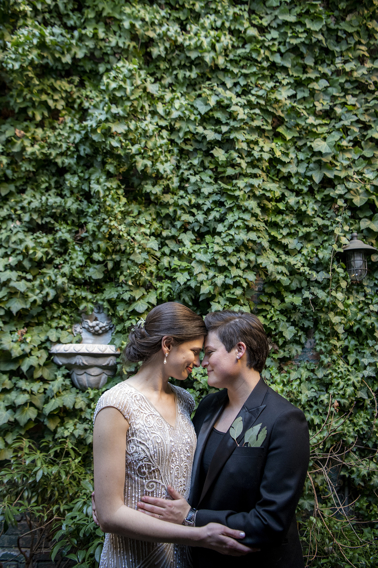 2 brides wedding portraits before their West Village intimate backyard wedding in NYC. LGBTQ wedding