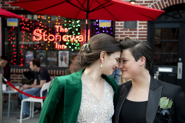 2 brides wedding portraits at Stonewall Inn in NYC. LGBTQ wedding