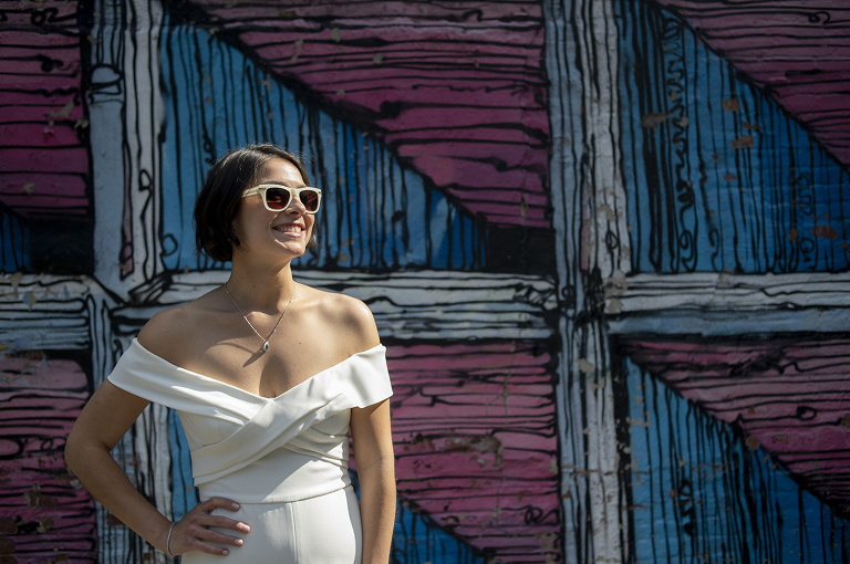 bride with mural at Jersey City elopement