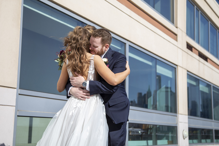 bride and groom first look on fall wedding at Liberty House in Jersey City