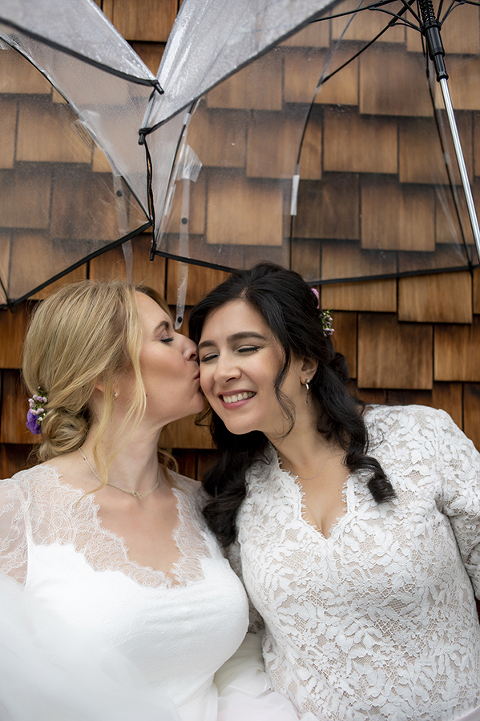 Two brides pose for portraits at Reeves-Reed Arboretum Wedding | LGBTQ wedding photographer
