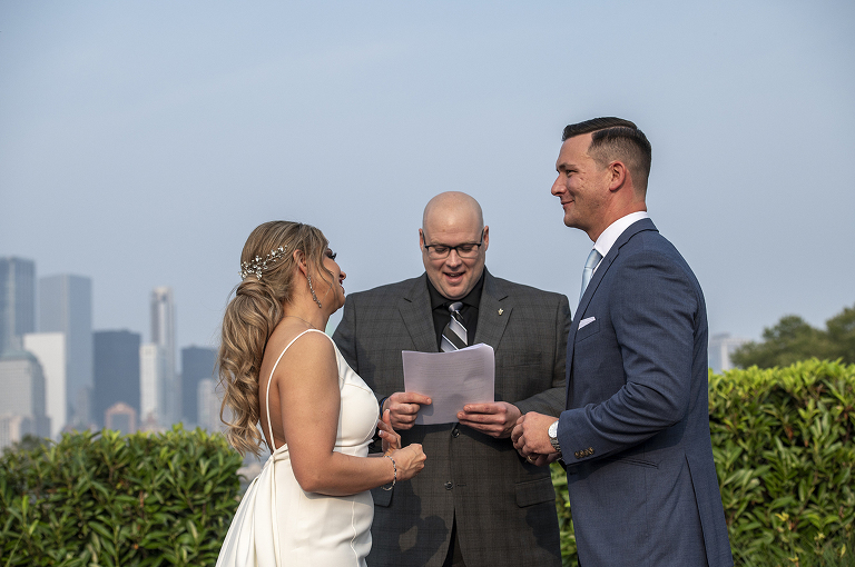 wedding ceremony with NYC skyline at Liberty House in Jersey City