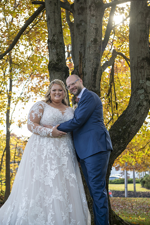 bride and groom on fall wedding day at Stone House at Stirling Ridge