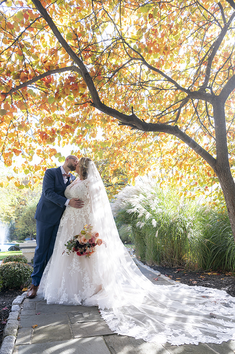 bride and groom at fall wedding at Stone House at Stirling Ridge