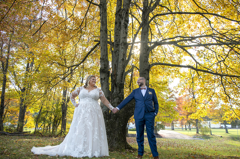 bride and groom at fall wedding at Stone House at Stirling Ridge