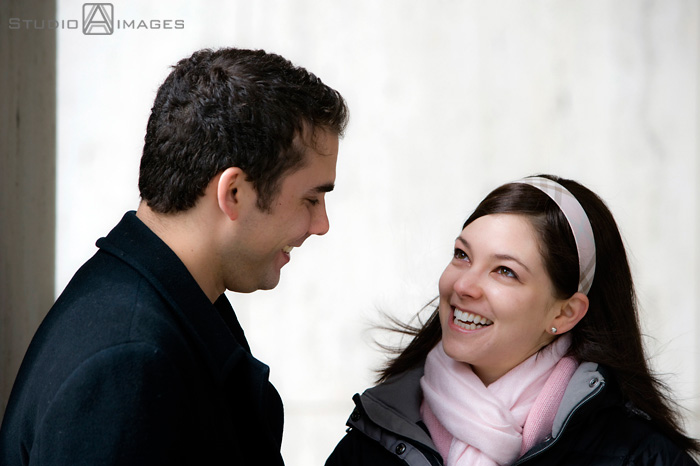 engaged couple laughing during their NYC engagement session