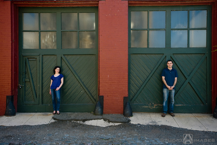 engaged couple on Court Street during their Hoboken engagement session