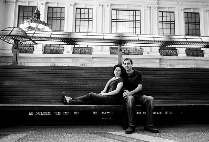 engaged couple Hoboken train station during their Hoboken engagement session