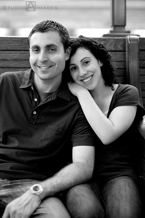 engaged couple Hoboken train station during their Hoboken engagement session