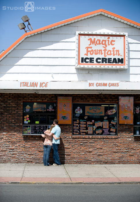 engaged couple hugging in front of ice cream shop, Couples, Engagement, Bayonne, Magic Fountain Ice Cream, Hoboken, Love, NJ, NJ wedding photography, Photography, Portraits, Studio A Images, wedding photography