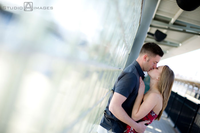 cute couple kissing at the train station, Couples, Engagement, Bayonne, Magic Fountain Ice Cream, Hoboken, Love, NJ, NJ wedding photography, Photography, Portraits, Studio A Images, wedding photography, engagement photography