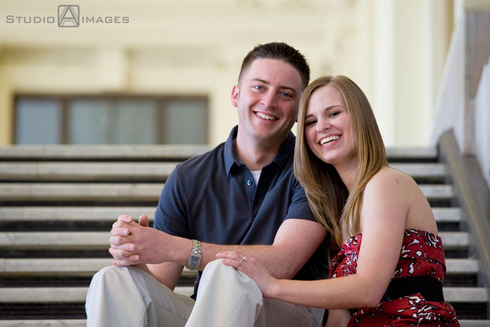 engaged couple sitting on steps at train station, Couples, Engagement, Bayonne, Magic Fountain Ice Cream, Hoboken, Love, NJ, NJ wedding photography, Photography, Portraits, Studio A Images, wedding photography, engagement photography