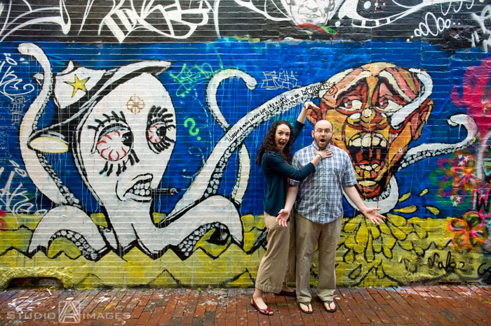 Cambridge, graffiti, Couples, Engagement, engagement photography, engagement photos, Love, MA, Massachusetts, Massachusetts wedding photography, Photography, Portraits, Studio A Images, wedding photography, Massachusetts engagement photos, Cambridge engagement photos, rainy day photos, umbrellas