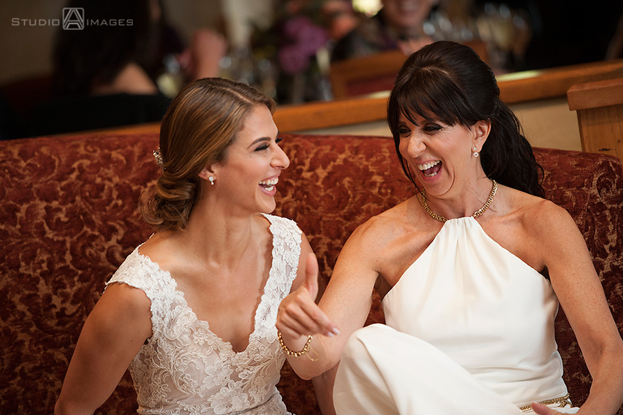 brides laughing at wedding at Harvest on Hudson