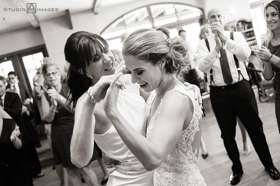 brides dancing together at Harvest on Hudson