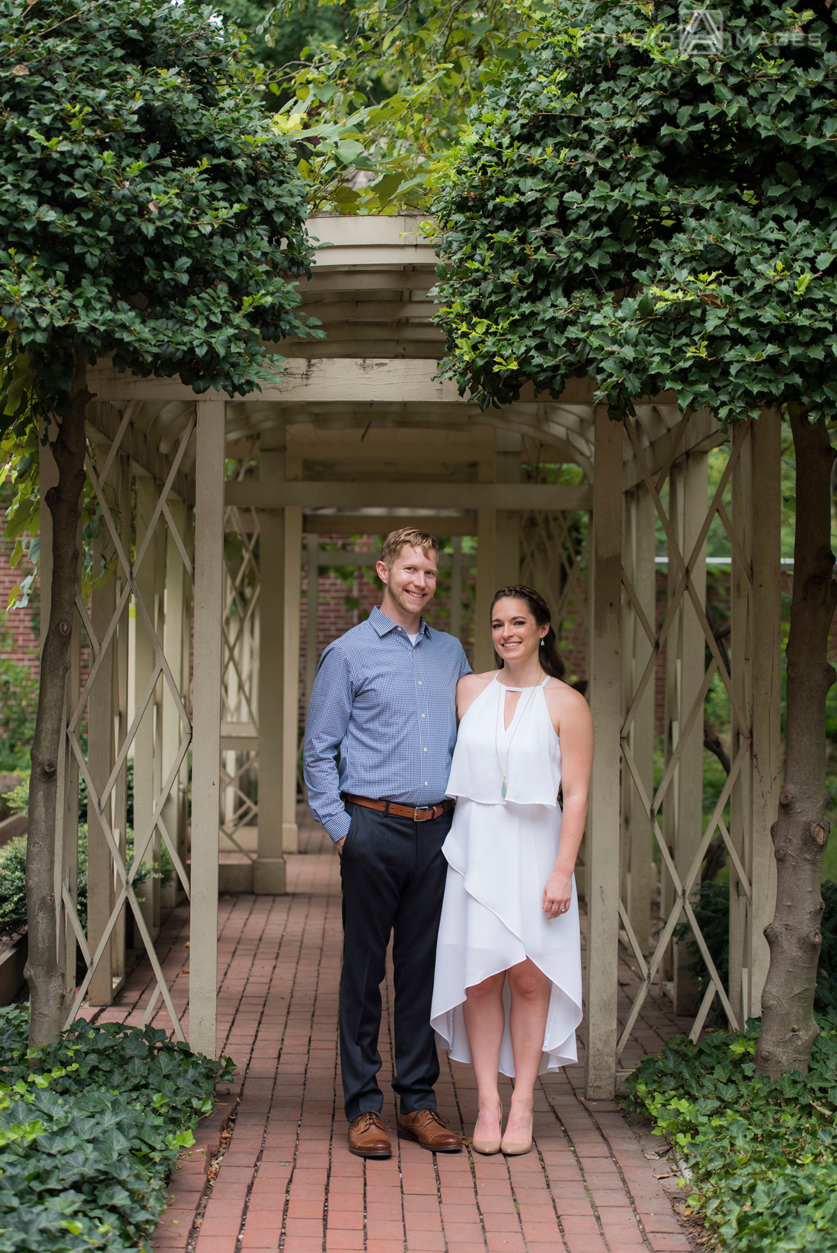 couple at 18th century garden in Philadelphia for their engagement photos