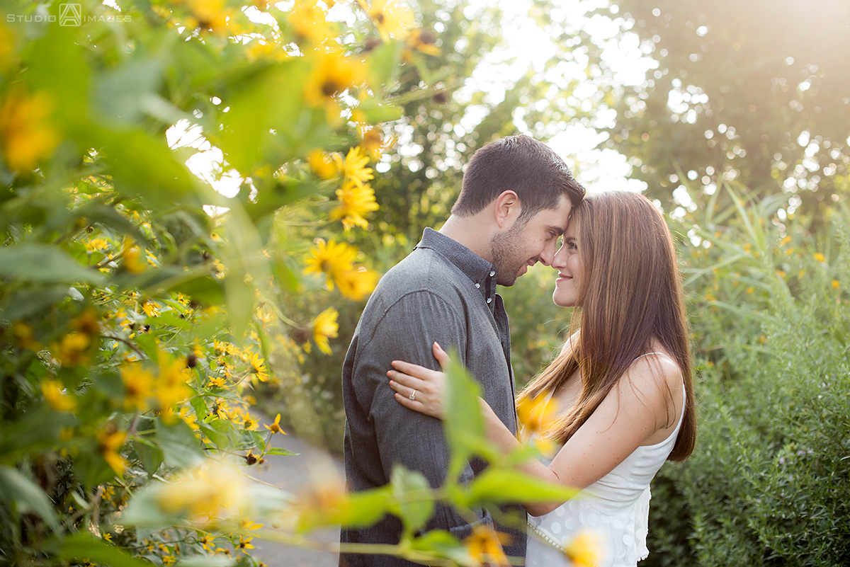 couple posing for their engagement photos at Governors Island