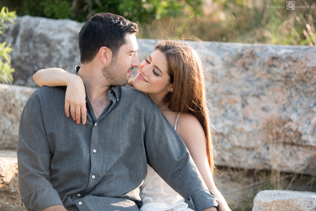 couple posing for their engagement photos at Governors Island